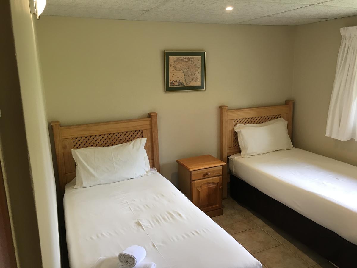 Dragon Peaks Mountain Resort Champagne Valley Exterior foto